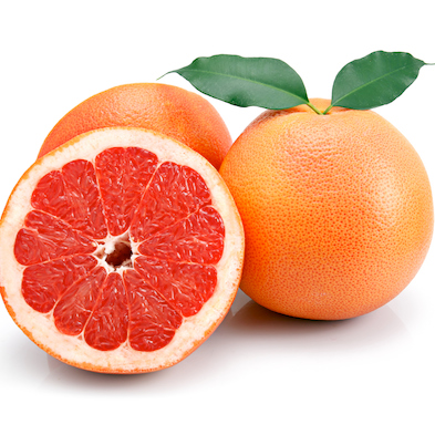 Grapefruit fruits with cuts and green leaf isolated